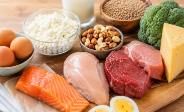 High-Protein Foods with Salmon, Eggs, Chicken, Beef, Dairy, Nuts, and Legumes High-protein foods including salmon, eggs, chicken, beef, cottage cheese, nuts, legumes, and broccoli